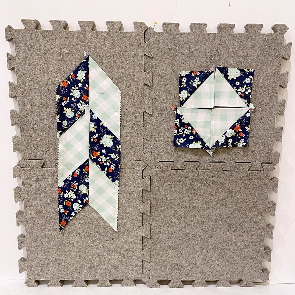 Quilting project with patterned fabric on Wool Press n Lock Tiles Wool Pressing Mat design wall