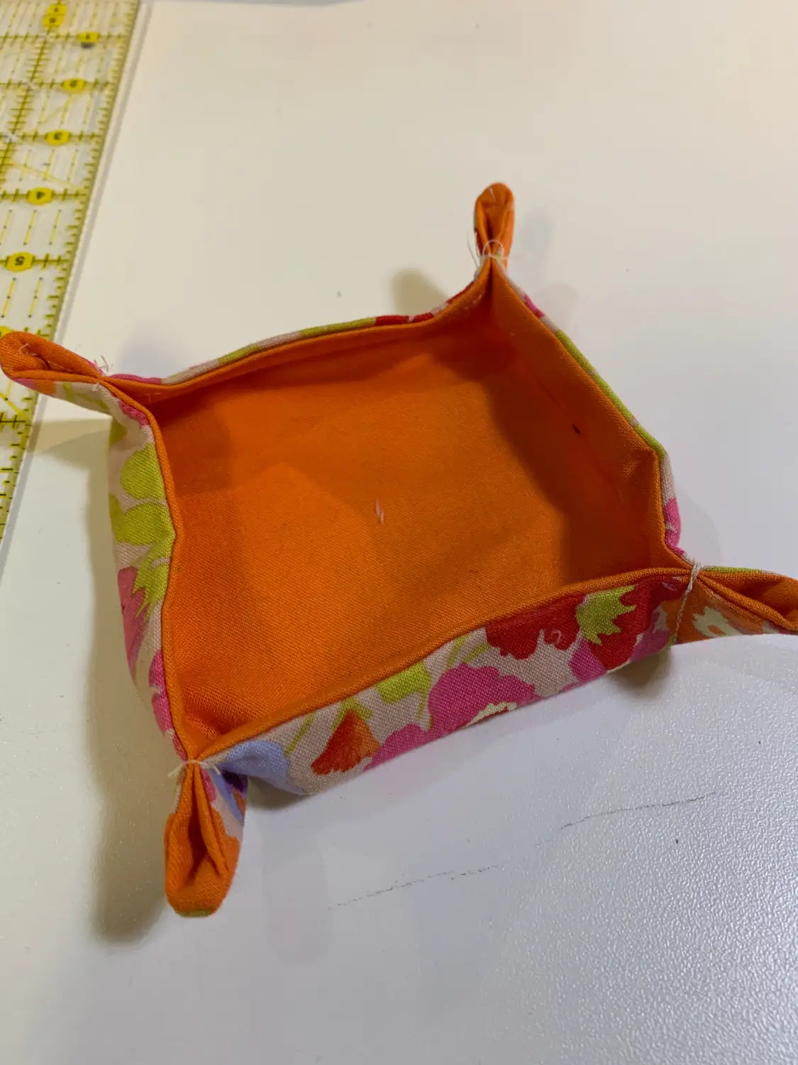a fabric catch-all tray made of quilting cotton 