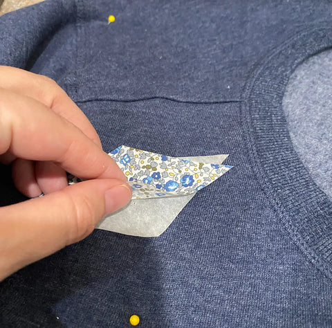 Remove Fusible Backing by peeling paper off