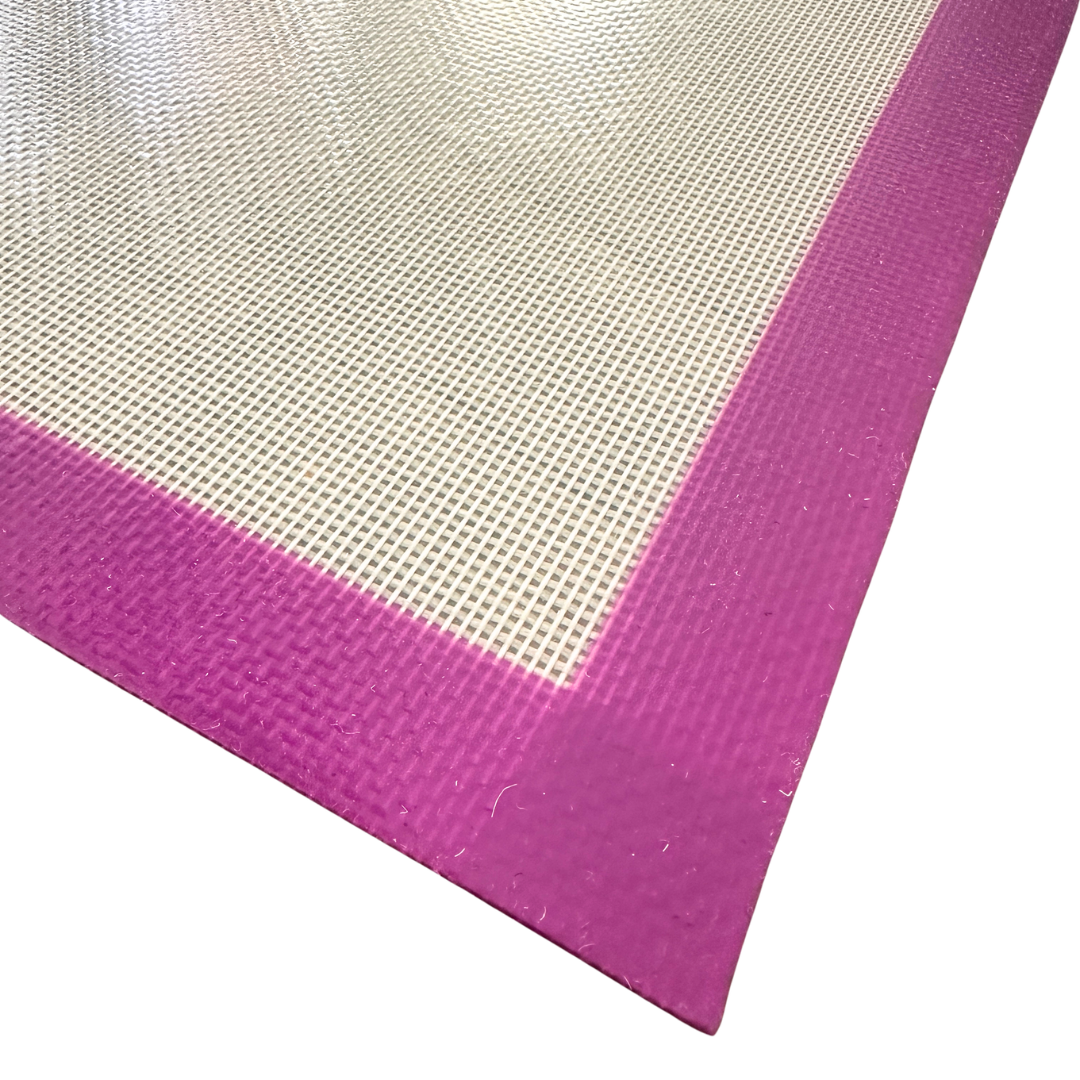 Silicone Applique Mat protecting a table from iron heat and moisture