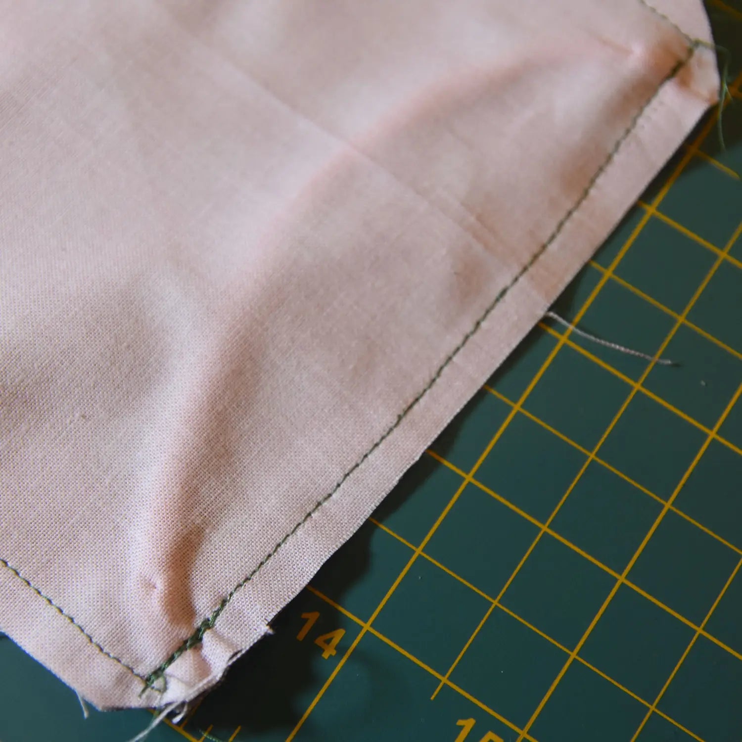 Insertion of mask elastic between panels