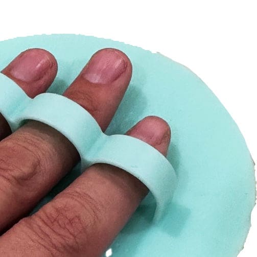 Mint green silicone scalp massager with finger loops, perfect handy mat scrubber or fabric steadier
