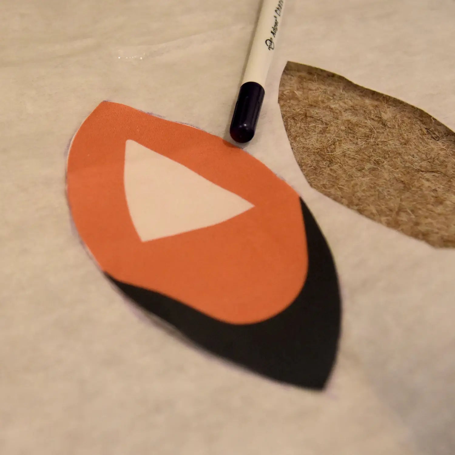 Trace mask ear with heat and bond