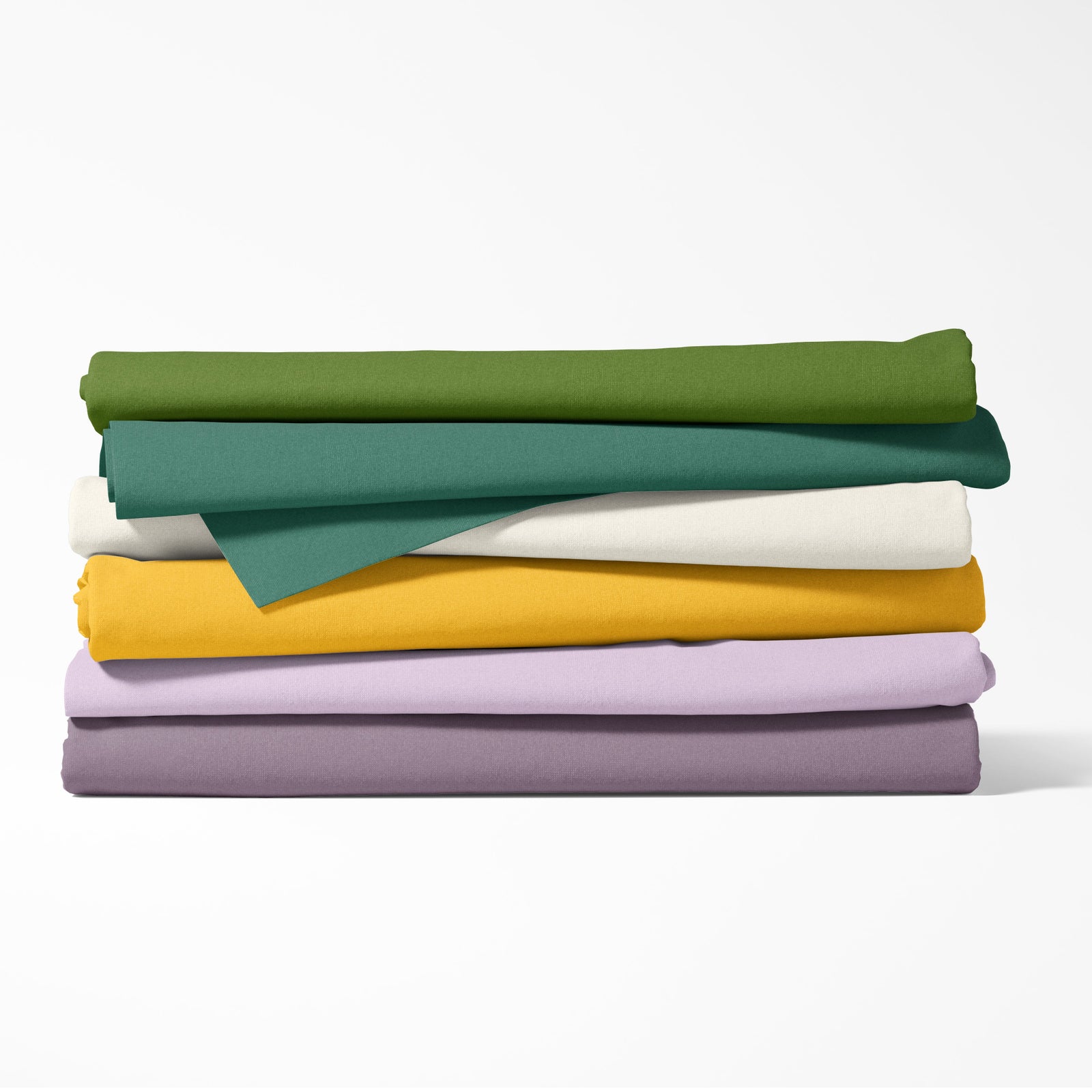 Stack of folded fabric sheets in green, teal, yellow, white, and purple on a white background