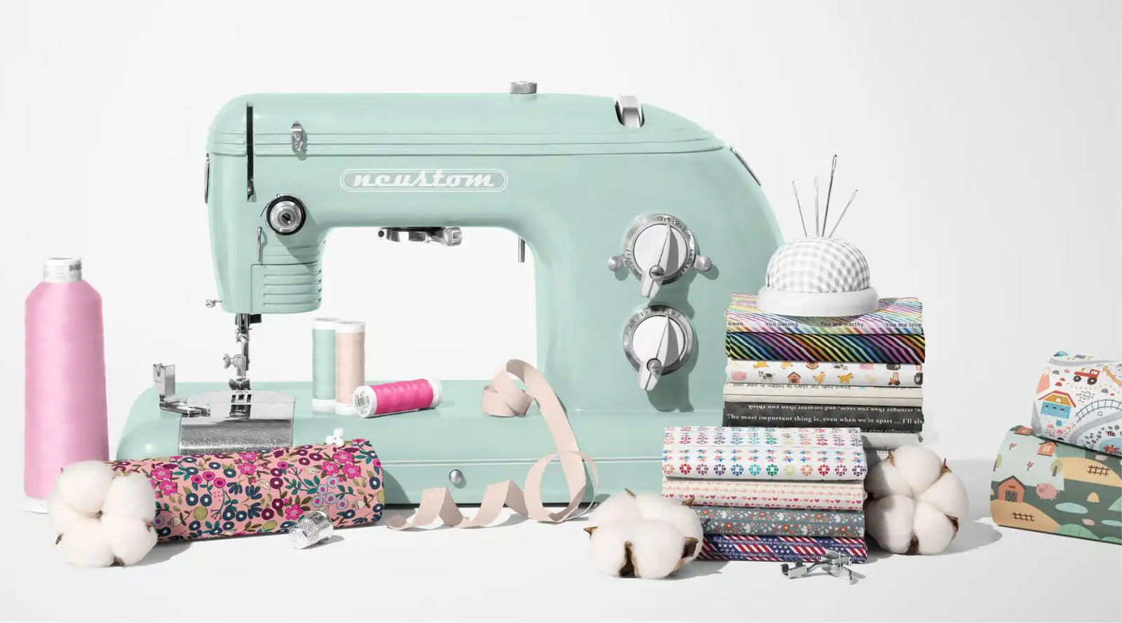 Mint green retro-style sewing machine.