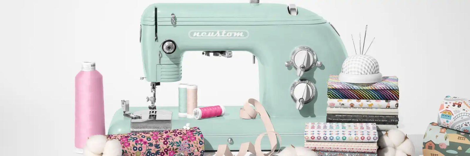Mint green vintage-style sewing machine.