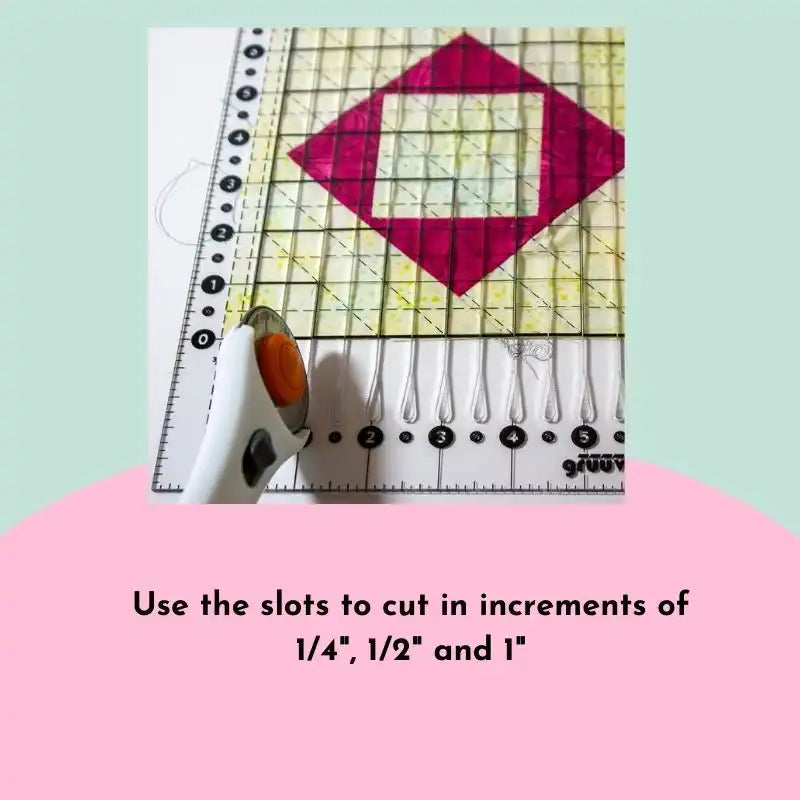 Rotary cutter and quilting ruler for precise fabric cutting.