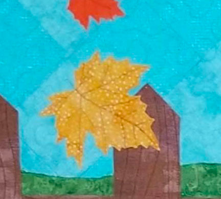 Fence post and leaf